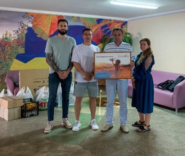 Travellizy im Kinderpflegeheim im Dorf Krasnosilka